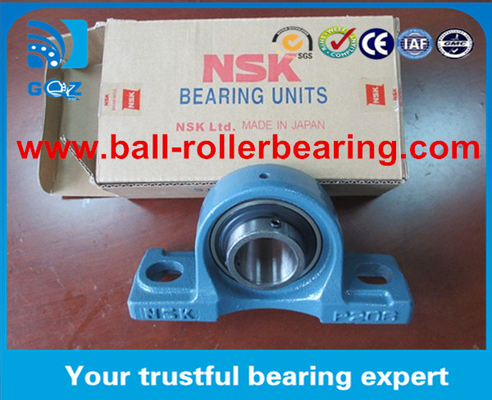 NSK UCP200 Series cushion block ball bearings with cast iron housing material (Các vòng bi khối gối NSK UCP200 với vật liệu thép đúc)